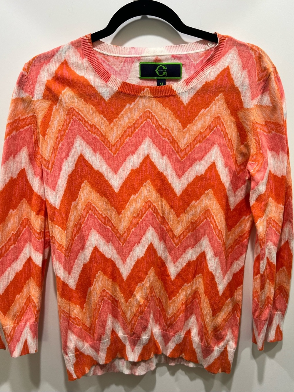 C. Wonder by Christian Seriano. 
Subtle Chevron Striped Knit Top Orange & Pink